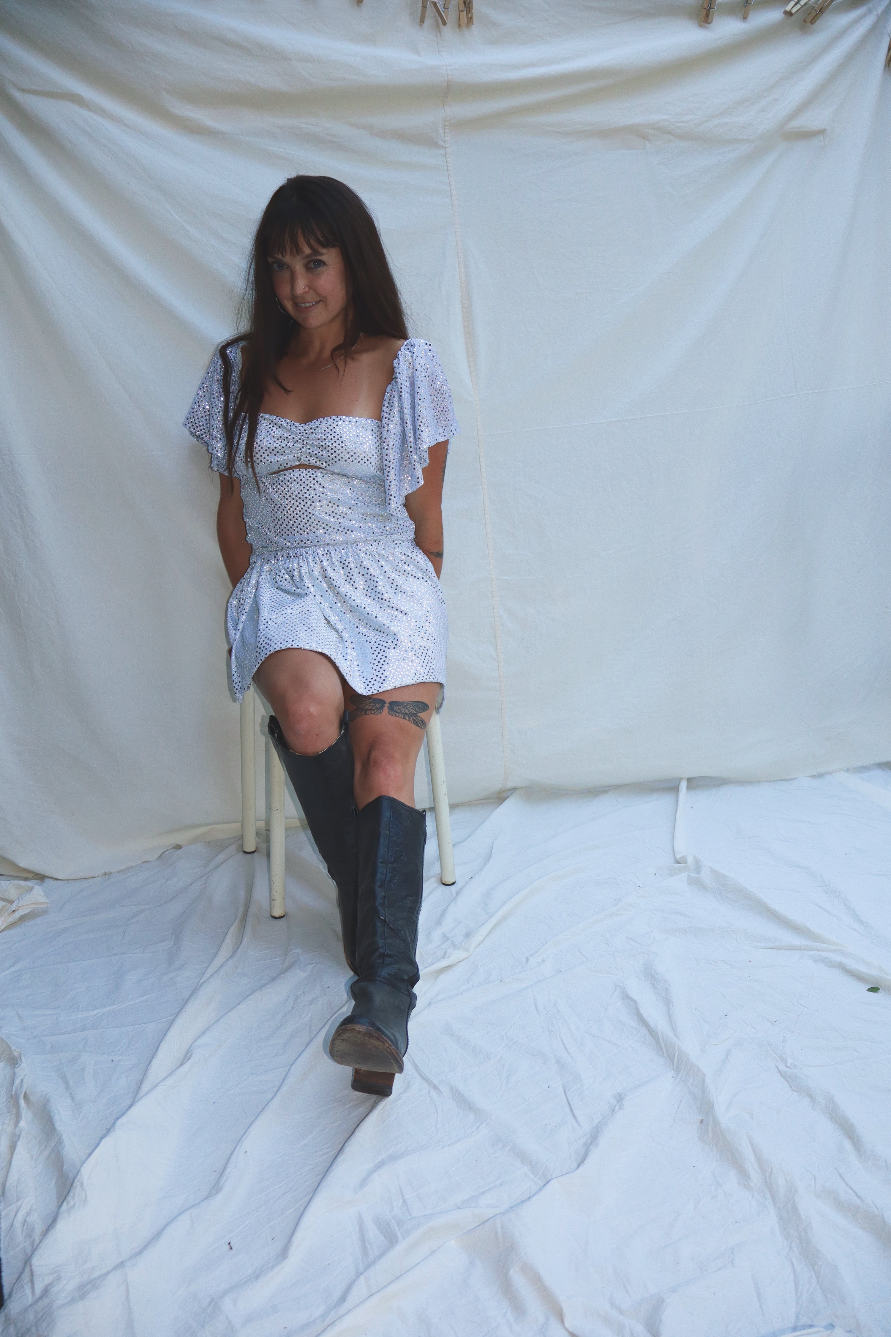 A photo of me, wearing a dress I made from scratch